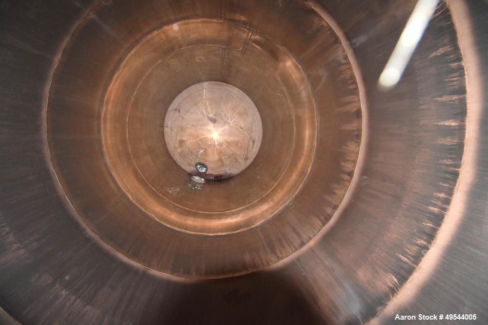 Used Tank, Approximate 19,500 Gallon, 14 Gauge Stainless steel, Vertical. Approximate 130” diameter x 336” straight side, coned top, 7” sloped bottom. Openings top 16” man way with cover and approxim...