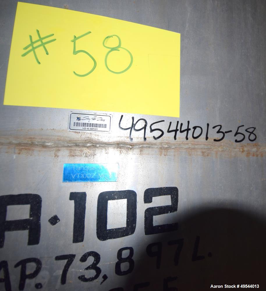 Used Tank, Approximate 19,500 Gallon, 14 Gauge Stainless steel, Vertical. Approximate 130” diameter x 336” straight side, coned top, 7” sloped bottom. Openings top 16” man way with cover and approxim...
