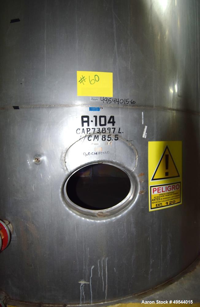 Used Tank, Approximate 19,500 Gallon, 14 Gauge Stainless steel, Vertical. Approximate 130” diameter x 336” straight side, coned top, 7” sloped bottom. Openings top 16” man way with cover and approxim...