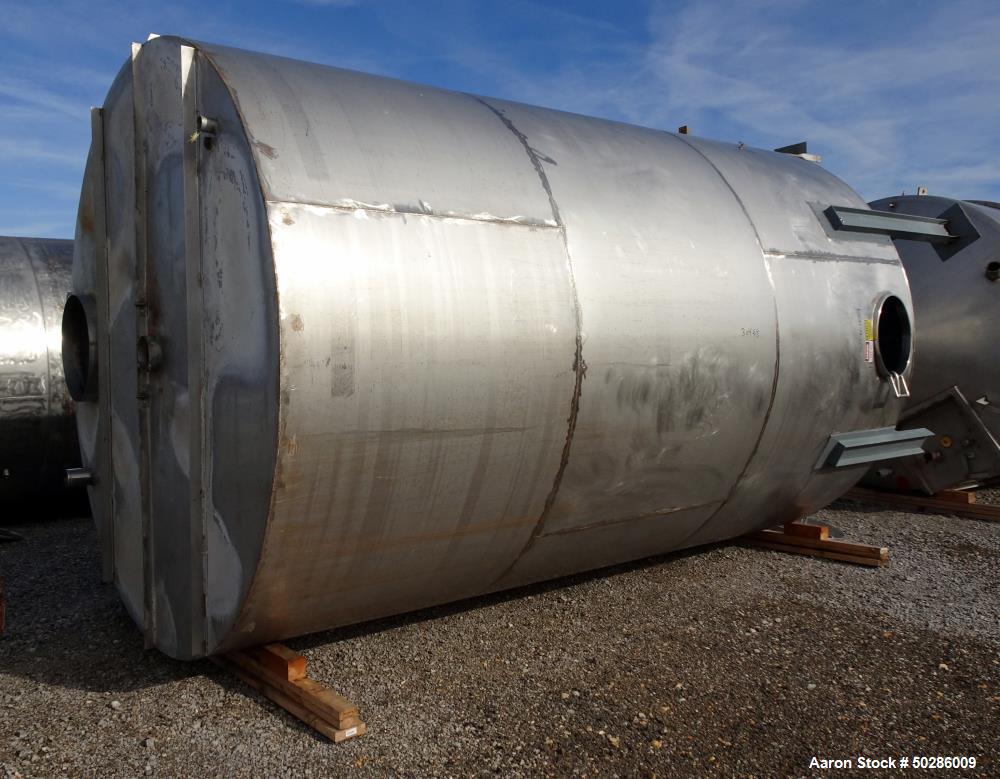 Used- Tank, 8,000 Gallon, 304 Stainless Steel, Vertical. Approximate 112" diameter x 180" straight side, flat top, coned bot...