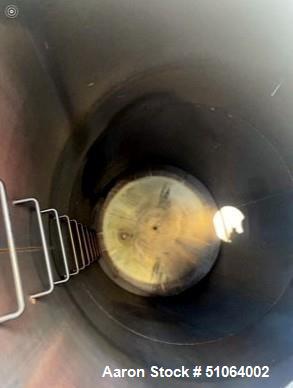 Used Tank, 6,000 Gallon. 8' diameter x 16' straight side.   Overall height:  21' 6". Vertical. Dished top and bottom on Carbon steel legs. Clearance from bottom of valve to ground: 30".