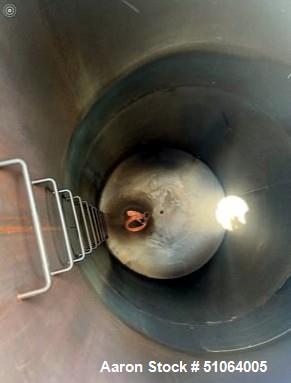 Used Tank, 6,000 Gallon. 8' diameter x 16' straight side.   Overall height:  21' 6". Vertical. Dished top and bottom on Carbon steel legs. Clearance from bottom of valve to ground: 30".