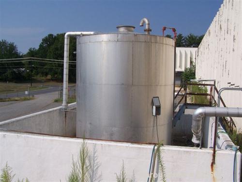 USED: 7500 gallon, 304 stainless steel, vertical tank. Slight dishtop, flat bottom, 10' diameter x 13' overall height, insul...