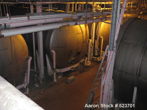 USED: Tank, 42,748 gallon, 304 stainless steel. 13'3" diameter xapproximately 41' long. Horizontal on carbon steel cradle frame.Flat horizontal bottom, dished heads. 1/8" wall.
