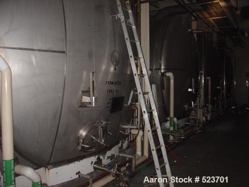 USED: Tank, 42,748 gallon, 304 stainless steel. 13'3" diameter xapproximately 41' long. Horizontal on carbon steel cradle frame.Flat horizontal bottom, dished heads. 1/8" wall.