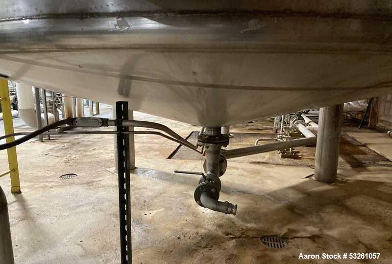 Used Approximate 9000 gallon Stainless Steel Storage Tank With 5 HP Centrifugal Pump, V-4780. approximate 120' X 15' T/T. Misc. top inlets. Cone bottom with center bottom outlet. Bottom side manway. ...