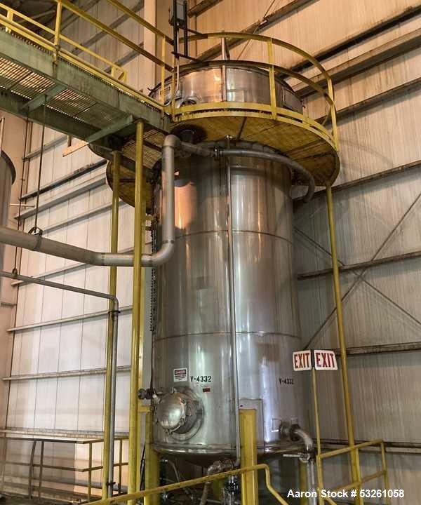 Used Approximate 6,750 gallon Stainless Steel Tank With Diaphragm Pump, V-4332. Flat top with misc. inlets & openings. Cone bottom with center bottom outlet. Side bottom manway. Has stainless steel l...