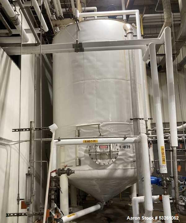 Used Approximate 8,900 gallon 316L Stainless Steel Agitated Tank With Goulds Centrifugal Pump, V-4139, P-4139.  Atmos. at 212 degrees F internal pressure. Top entering Agitator (HP unknown). Cone bot...