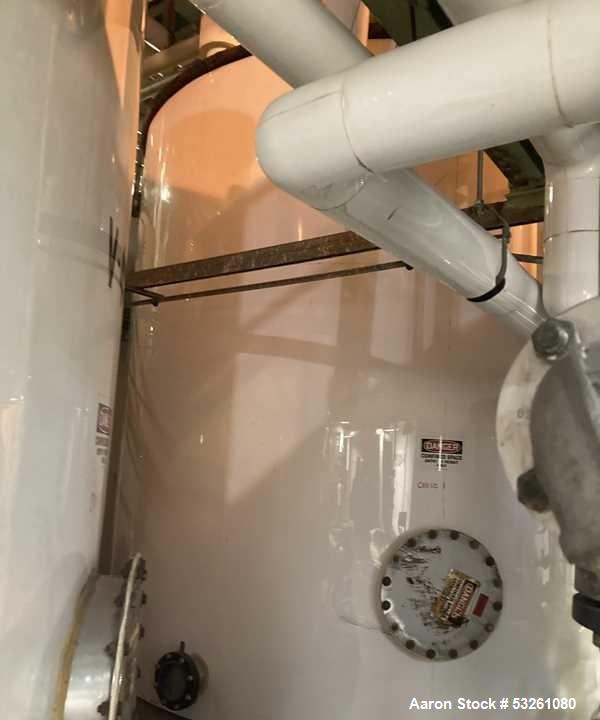 Used Approx. 7,900 Gallon Stainless Steel Mixing Tank with Griswold Pump – V-4313