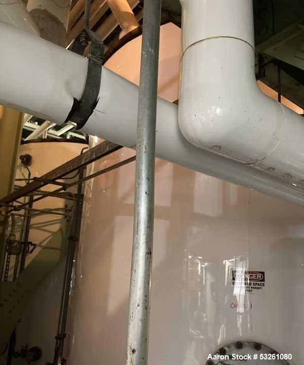 Used Approx. 7,900 Gallon Stainless Steel Mixing Tank with Griswold Pump – V-4313