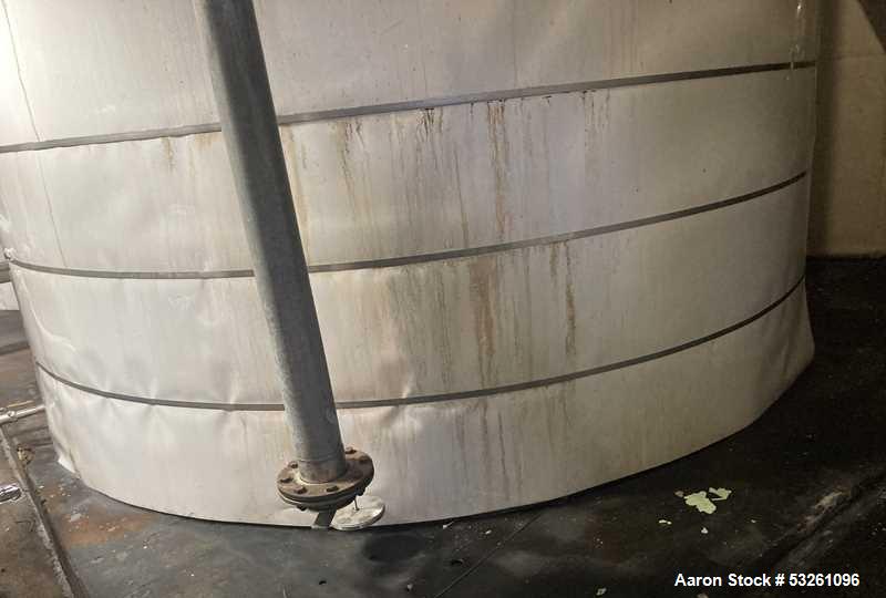 Used Approximate 7900 gallon Stainless Steel Mixing Tank, V-4206. With a Worthington pump model D1012. 316 SS. S/N Y715556. 7.5 HP, 3 PH, 50/60 HZ, 208-230V.