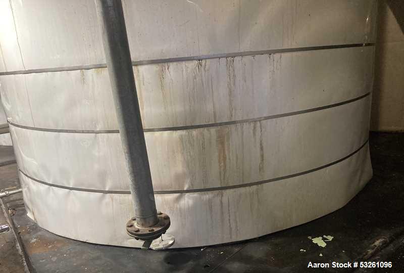 Used Approximate 7900 gallon Stainless Steel Mixing Tank, V-4206. With a Worthington pump model D1012. 316 SS. S/N Y715556. 7.5 HP, 3 PH, 50/60 HZ, 208-230V.