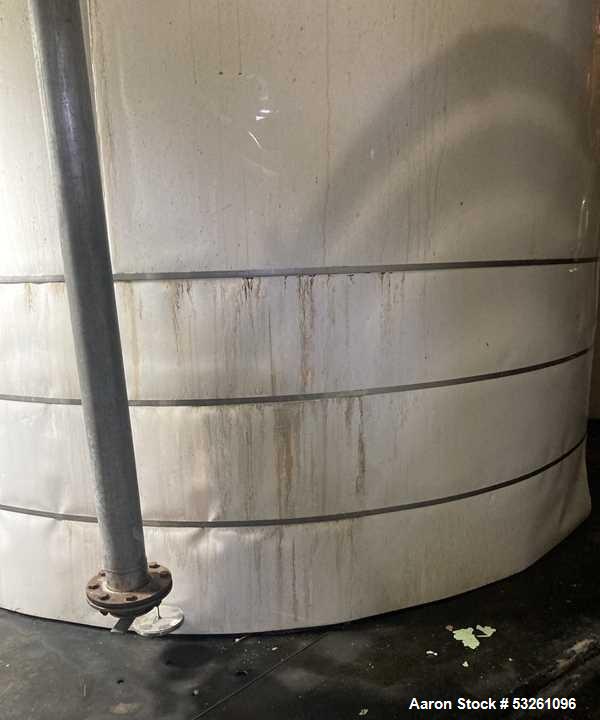 Used Approximate 7900 gallon Stainless Steel Mixing Tank, V-4206. With a Worthington pump model D1012. 316 SS. S/N Y715556. 7.5 HP, 3 PH, 50/60 HZ, 208-230V.