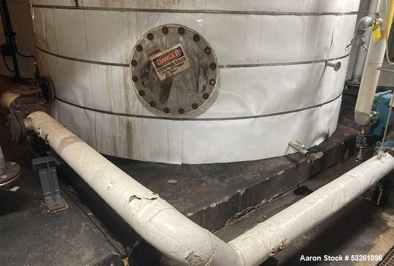 Used Approximate 7900 gallon Stainless Steel Mixing Tank, V-4206. With a Worthington pump model D1012. 316 SS. S/N Y715556. 7.5 HP, 3 PH, 50/60 HZ, 208-230V.