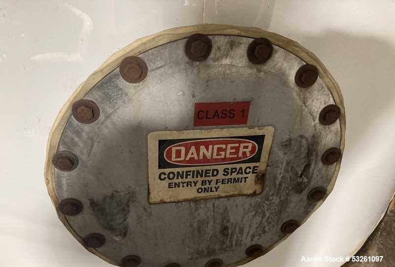 Used Approximate 7900 gallon Stainless Steel Mixing Tank, V-4320. Pump P-4320: Industrial Electric Motor. 60 hz, 230/460 V.