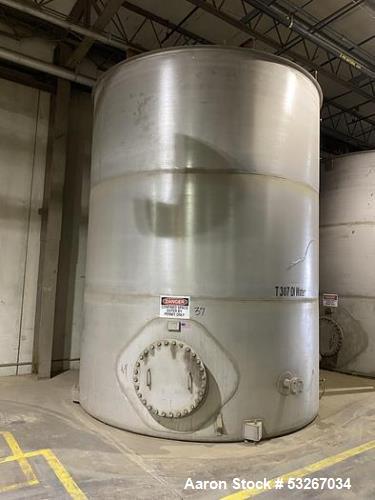 Wolfe Mechanical approximately 12,600 gallon 304L stainless steel vertical tank.