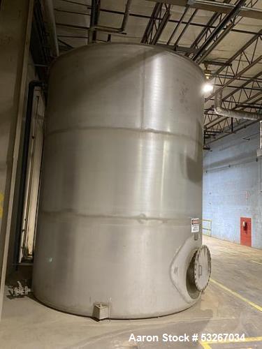 Wolfe Mechanical approximately 12,600 gallon 304L stainless steel vertical tank.