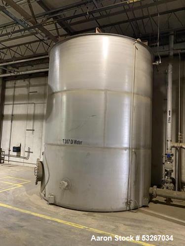 Wolfe Mechanical approximately 12,600 gallon 304L stainless steel vertical tank.
