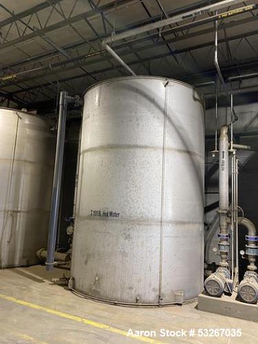 Wolfe Mechanical approximately 10,000 gallon 304L stainless steel vertical tank.