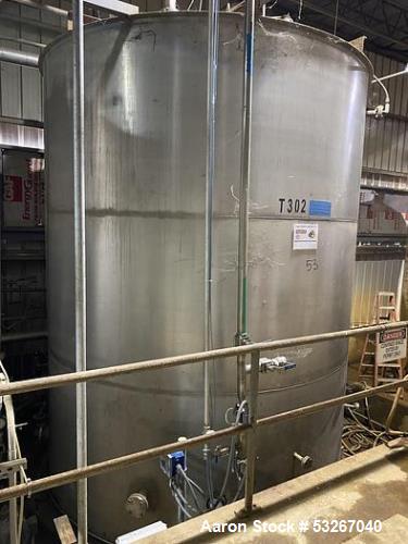 Wolfe Mechanical approximately 12,600 gallon 304L stainless steel vertical tank.