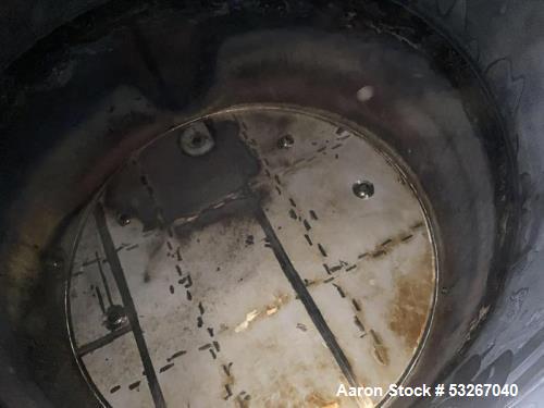 Wolfe Mechanical approximately 12,600 gallon 304L stainless steel vertical tank.