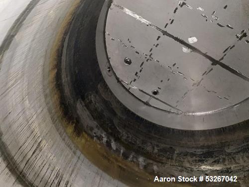 Wolfe Mechanical approximately 12,600 gallon 304L stainless steel vertical tank.
