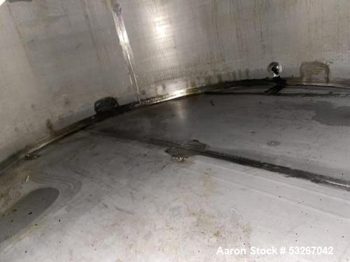 Wolfe Mechanical approximately 12,600 gallon 304L stainless steel vertical tank.