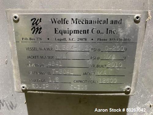 Wolfe Mechanical approximately 12,600 gallon 304L stainless steel vertical tank.