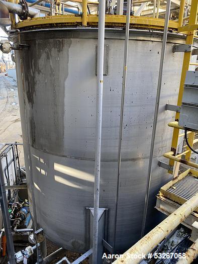 Used Vertical Stainless Steel Tank, Approx. 6,000 gallon capacity.