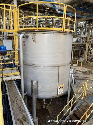 Used Vertical Stainless Steel Tank, Approx. 6,000 gallon capacity.