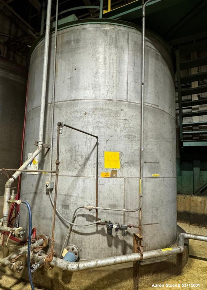 Used Stainless Steel Storage tank 10,000 gallon Capacity; Approx. 12' 6" Diameter x 12' High. Flat top and bottom.