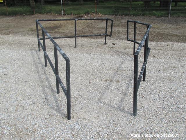 Used 11,000 gallon stainless steel storage tank, approximately 12'6" diameter X 11' straight side, dome top, flat bottom, approximately 24" top manway, 1.5" side nozzle, (2) 3" side bottom outlets.