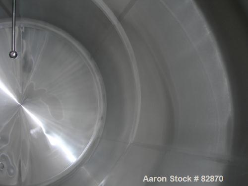 USED: Tank, 5,000 gallon, 304 stainless steel, horizontal. 96" diameter x 150" straight side, dished heads. Bottom of tank dimple jacketed, approx 6' wide x 7' long area. Insulated and carbon steel s...