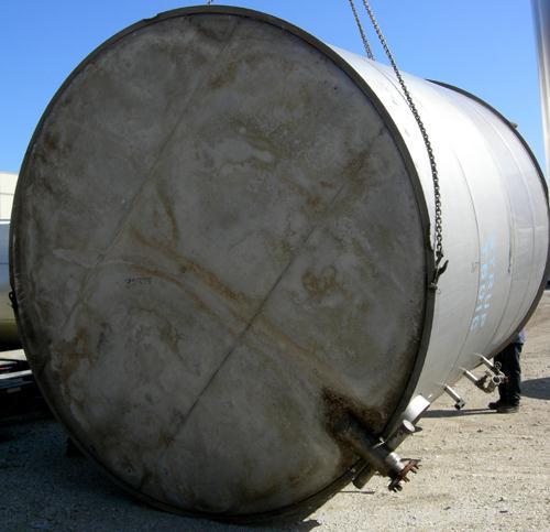 USED: Tank, 10,000 gallon, 304 stainless steel, vertical. Approximate 11' diameter x 14' straight side. Coned top, sloped bottom. Openings: top 18" manway with cover, 3", 6", 4"; 16" x 20" side oval ...