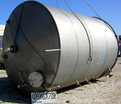 USED: Tank, 10,000 gallon, 304 stainless steel, vertical. Approximate 11' diameter x 14' straight side. Coned top, sloped bottom. Openings: top 18" manway with cover, 3-1/2", 6", 4"; 16" x 20" side o...