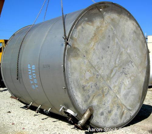 USED: Tank, 10,000 gallon, 304 stainless steel, vertical. Approximate 11' diameter x 14' straight side. Coned top, sloped bottom. Openings: top 18" manway with cover, 3-1/2", 6", 4"; 16" x 20" side o...