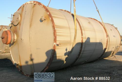 USED: Tank, 17,800 gallon, 316 stainless steel. Approximate 10'6" diameter x 27'6" straight side. Slight cone top and flat bottom. 24" side bottom manway. Top openings: (3) 2" flange, (2) 3" flange, ...