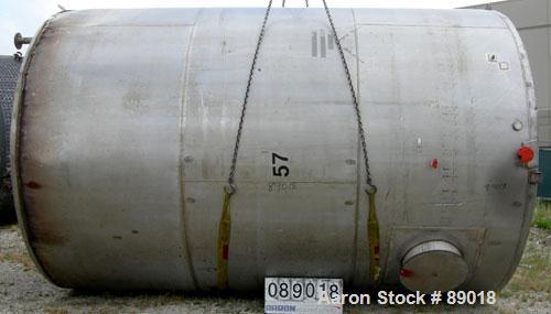 USED: Tank, 11,700 gallon, 304 stainless steel, vertical. Approximately 132" diameter x 198" straight side. Dished top, flat bottom. 10 turns of approximate 3" pipe coil. Openings: top 1-1/2", 4", 6"...