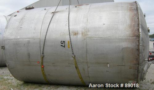 USED: Tank, 11,700 gallon, 304 stainless steel, vertical. Approximately 132" diameter x 198" straight side. Dished top, flat bottom. 10 turns of approximate 3" pipe coil. Openings: top 1-1/2", 4", 6"...
