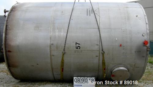 USED: Tank, 11,700 gallon, 304 stainless steel, vertical. Approximately 132" diameter x 198" straight side. Dished top, flat bottom. 10 turns of approximate 3" pipe coil. Openings: top 1-1/2", 4", 6"...
