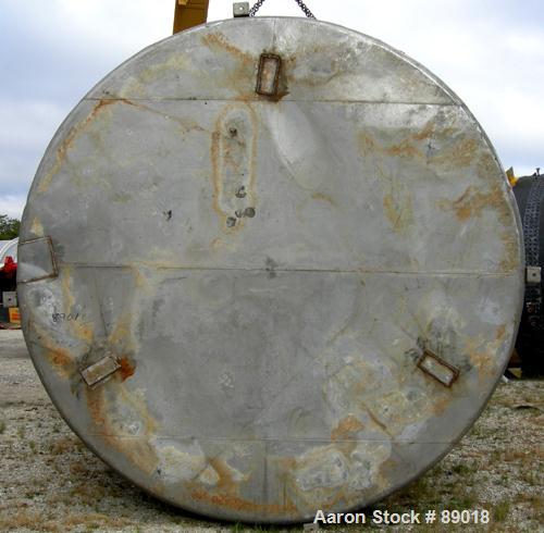 USED: Tank, 11,700 gallon, 304 stainless steel, vertical. Approximately 132" diameter x 198" straight side. Dished top, flat bottom. 10 turns of approximate 3" pipe coil. Openings: top 1-1/2", 4", 6"...