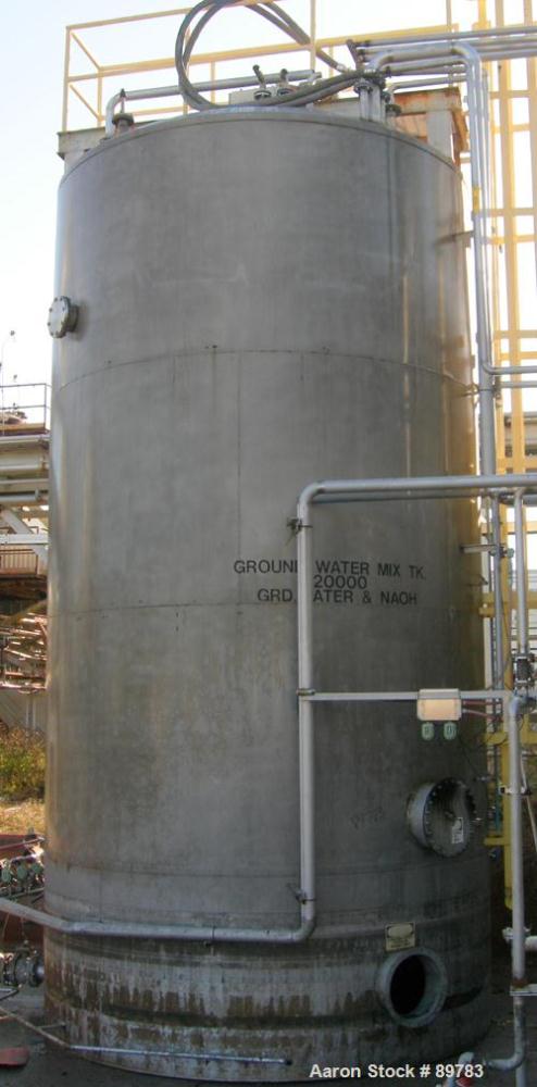 USED: Approximate 15,000 gallon stainless steel mix tank. Approximate 11'6" diameter x 18' straight side. Skirt mounted. Dish top, slight cone bottom. Various top and side openings. Side manway 16" w...