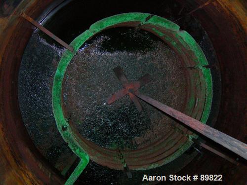 USED: Tank, 7,000 gallon, stainless steel, insulated, vertical. 10' diameter x 12' straight side. Dish top, flat bottom. Top openings: manway with cover, misc top openings. Shaft and impeller driven ...