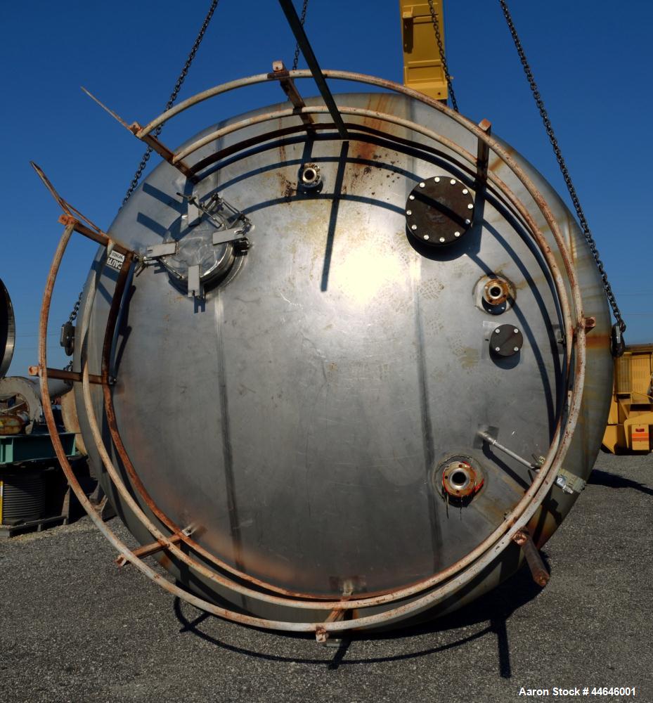 Used APV Crepaco Tank, Approximately 11,000 gallons, 304 Stainless Steel, Vertical. Approximate 138” diameter x 164” straight side, dished top, coned bottom. Approximate 60” wide section of bottom si...