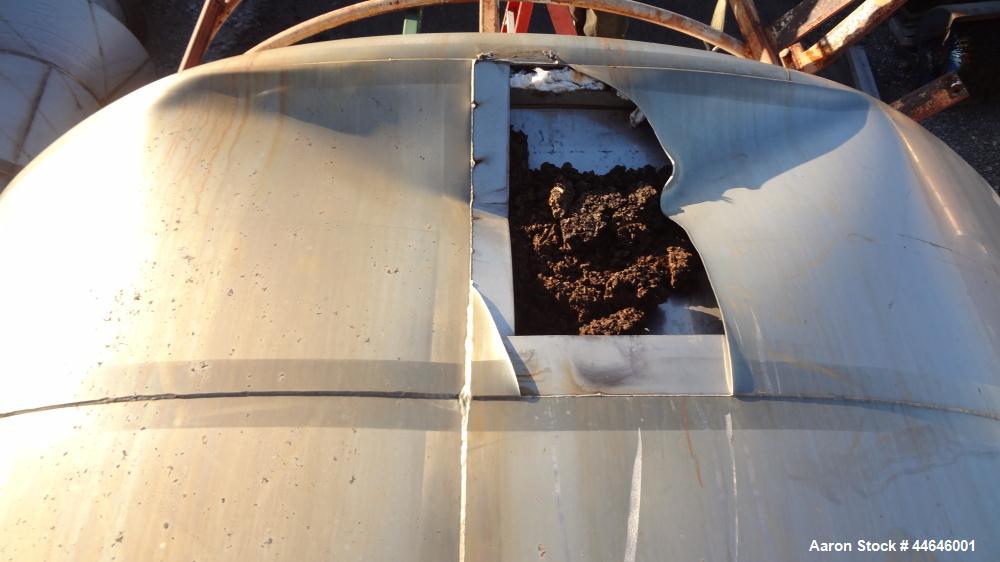 Used APV Crepaco Tank, Approximately 11,000 gallons, 304 Stainless Steel, Vertical. Approximate 138” diameter x 164” straight side, dished top, coned bottom. Approximate 60” wide section of bottom si...