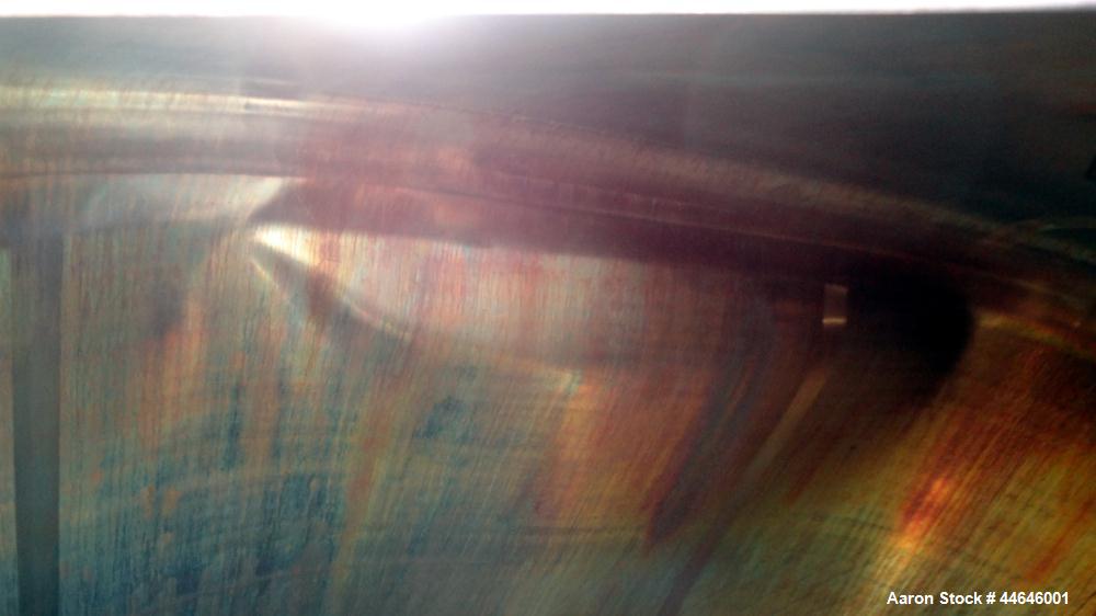 Used APV Crepaco Tank, Approximately 11,000 gallons, 304 Stainless Steel, Vertical. Approximate 138” diameter x 164” straight side, dished top, coned bottom. Approximate 60” wide section of bottom si...