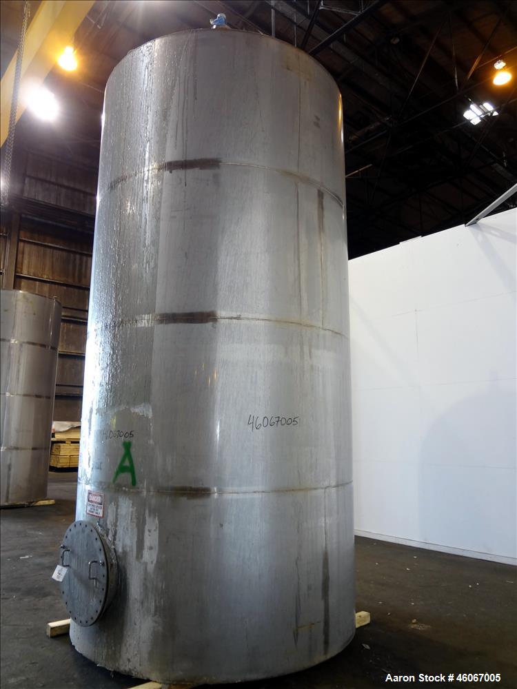 Used Acme Industrial Tank, 6000 Gallon, 304 Stainless Steel, Vertical. Approximate 192" Straight Side x 96" Diameter. Partial cone top, flat bottom. Top openings: 4", (3) 3", 6". Side openings: 24" m...