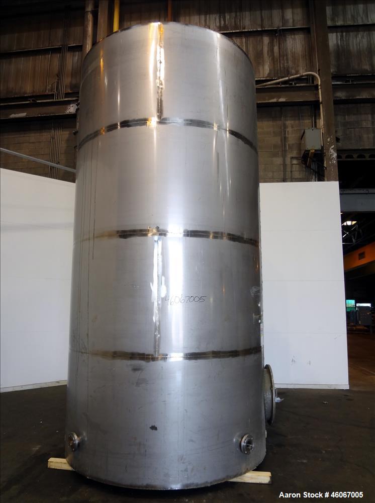 Used Acme Industrial Tank, 6000 Gallon, 304 Stainless Steel, Vertical. Approximate 192" Straight Side x 96" Diameter. Partial cone top, flat bottom. Top openings: 4", (3) 3", 6". Side openings: 24" m...