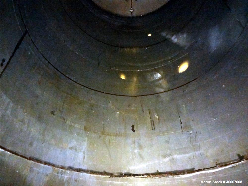 Used Acme Industrial Tank, 6000 Gallon, 304 Stainless Steel, Vertical. Approximate 192" Straight Side x 96" Diameter. Partial cone top, flat bottom. Top openings: 4", (3) 3", 6". Side openings: 24" m...