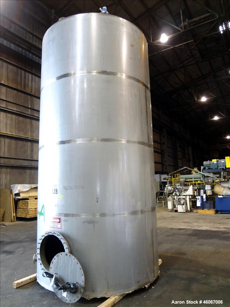 Used Acme Industrial Tank, 6000 Gallon, 304 Stainless Steel, Vertical. Approximate 192" Straight Side x 96" Diameter. Partial cone top, flat bottom. Top openings: 4", (3) 3", 6". Side openings: 24" m...